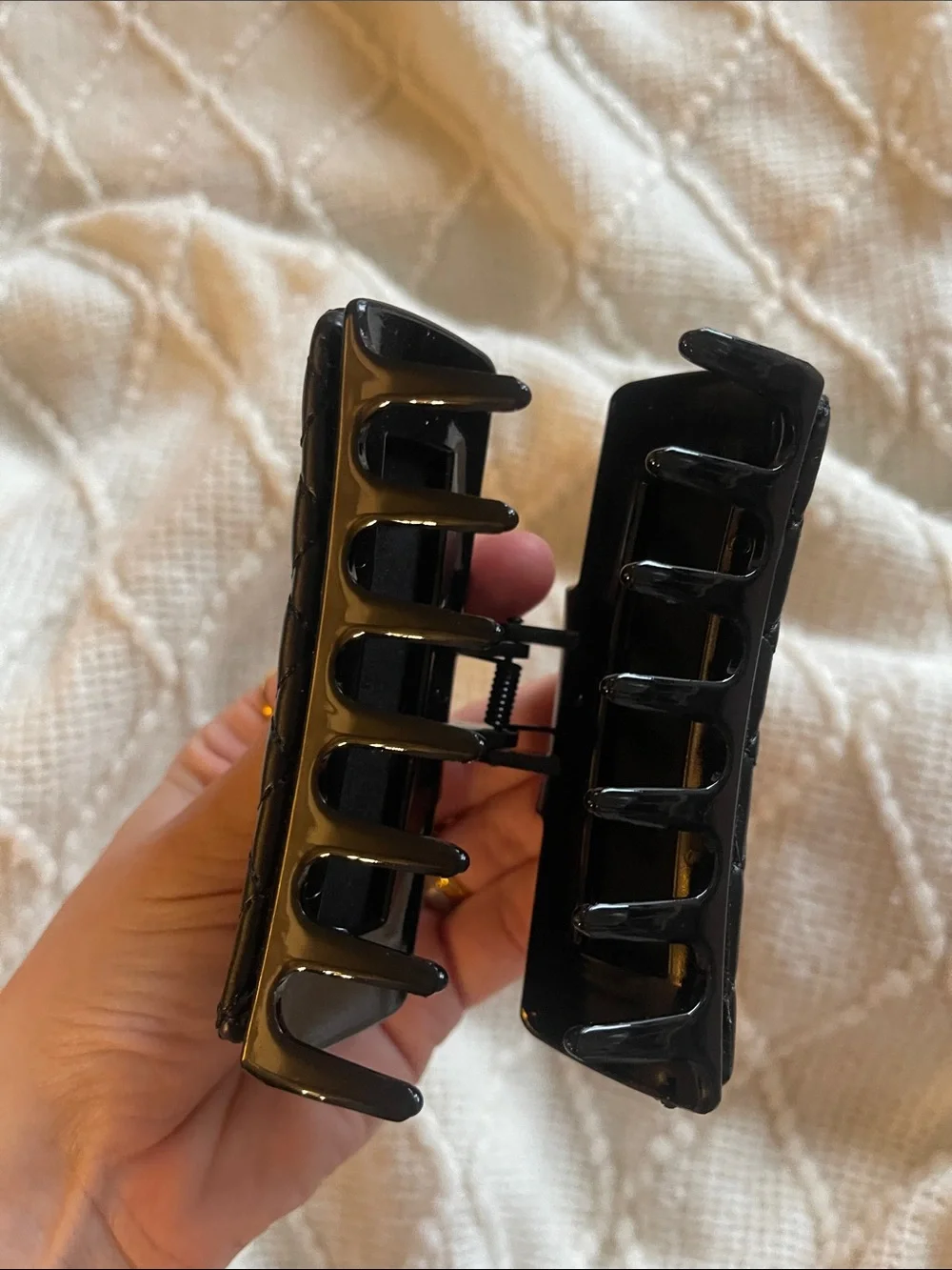 CHANEL Black Quilted Leather Hair Clip with Gold CC Emblem